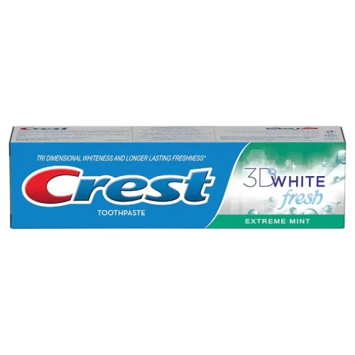 Close‑up of minty whitening tube with blue accents.