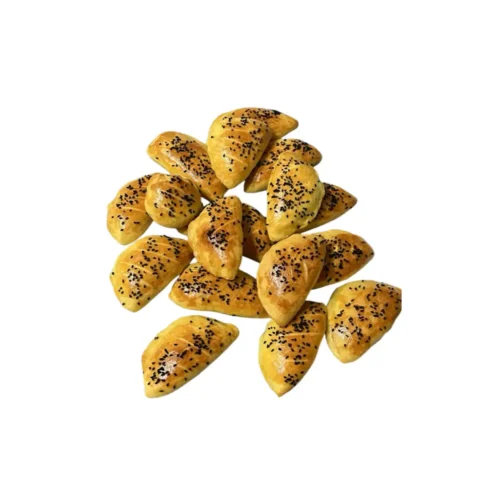 Golden borek pastry filled with cheese and sprinkled with black sesame.